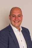 Pasfoto van wethouder Rico Schans