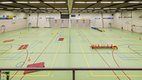 De binnenkant van 1 van de 2 zalen. Dit is de zaal met de groene vloer. 