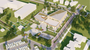 Bovenaanzicht van de nieuwe school, de parkeerplaatsen en gymzaal.